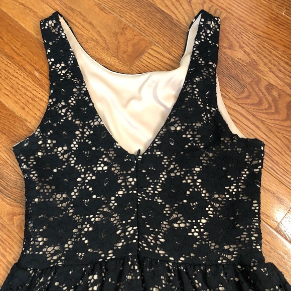 Black lace skater dress with a tan under skirt - Picture 4 of 4